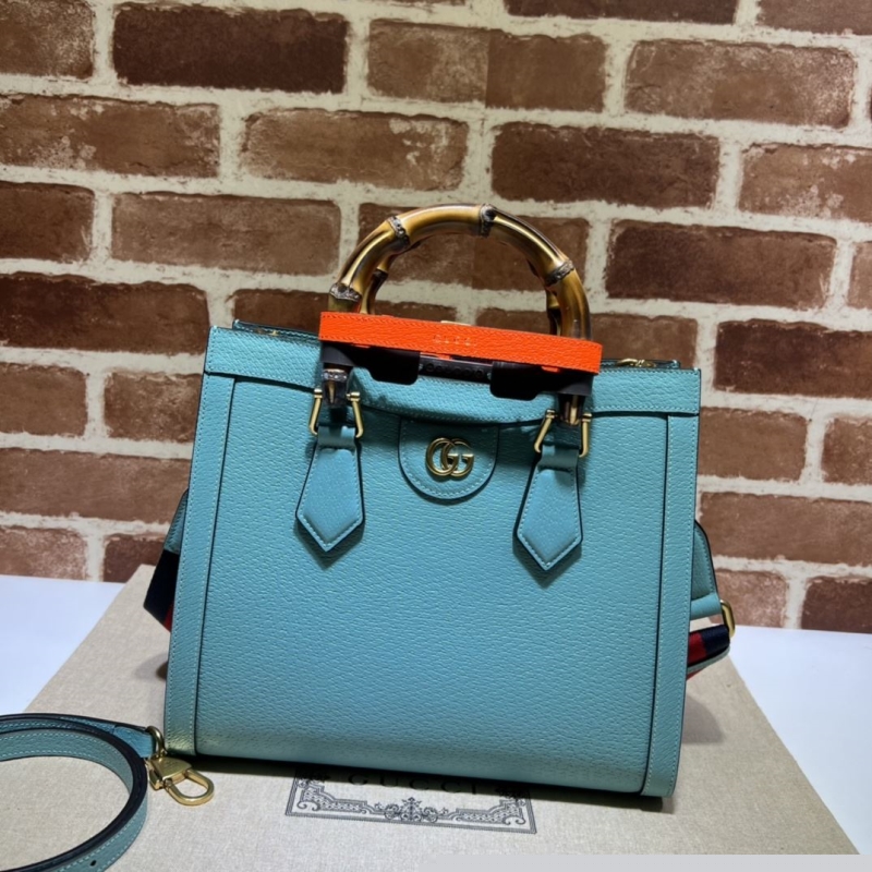 G*u*i top handle bags